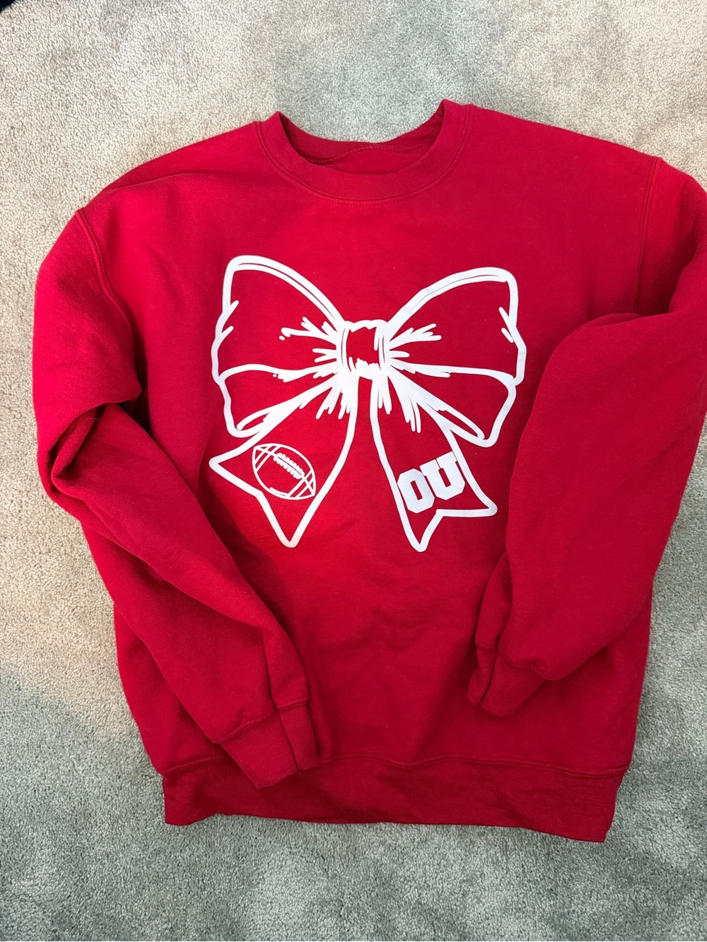 OU - Adult Small. Red Graphic Bow Sweatshirt with White Print
